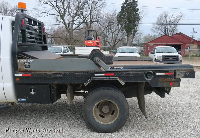 image for item DB8837 1999 Ford F350 Super Duty flatbed pickup truck