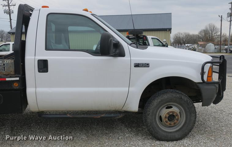 image for item DB8837 1999 Ford F350 Super Duty flatbed pickup truck