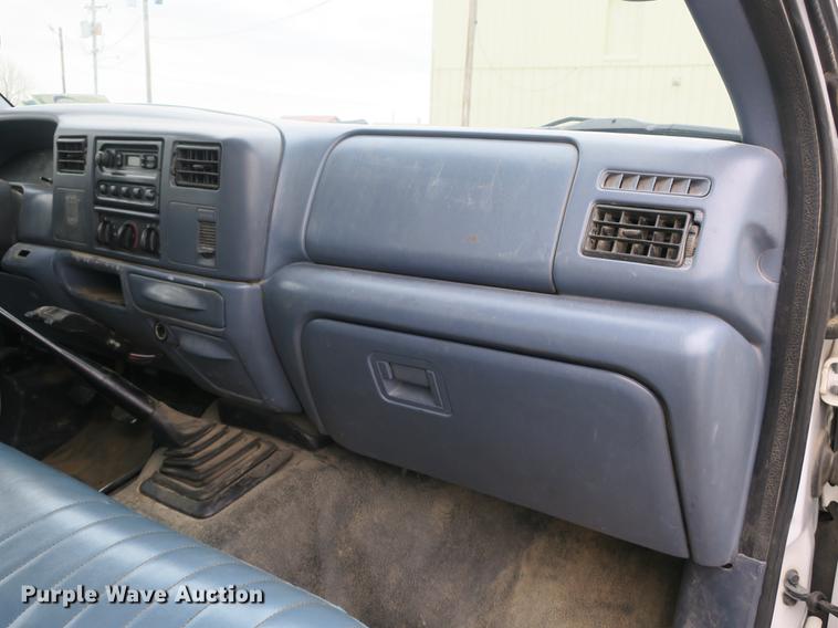 image for item DB8837 1999 Ford F350 Super Duty flatbed pickup truck