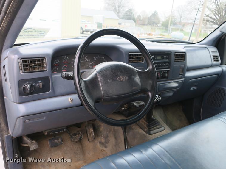 image for item DB8837 1999 Ford F350 Super Duty flatbed pickup truck