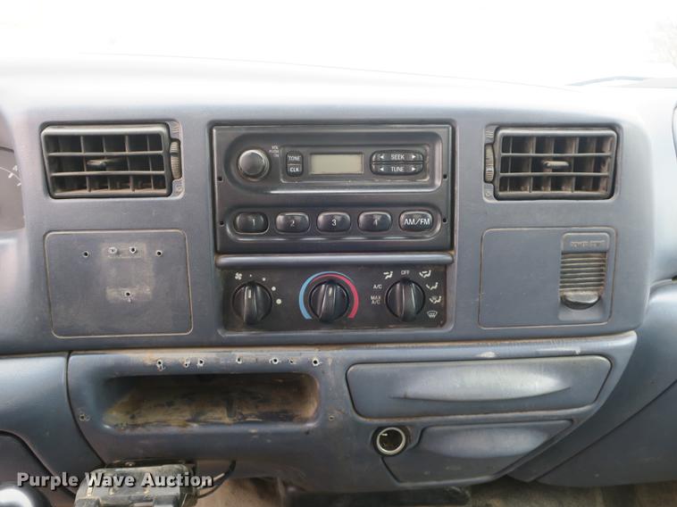 image for item DB8837 1999 Ford F350 Super Duty flatbed pickup truck