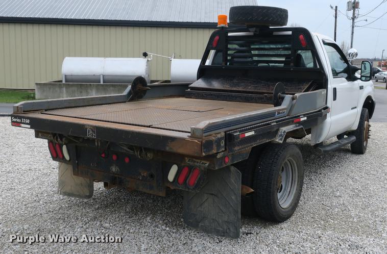 image for item DB8838 2002 Ford F550 XL flatbed truck