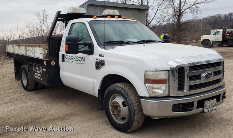 image for item DD4022 2008 Ford F350 Super Duty flatbed pickup truck