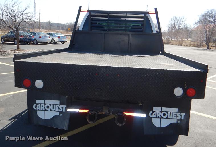 image for item DE0083 2007 Ford F350 Super Duty XL SuperCab flatbed pickup truck