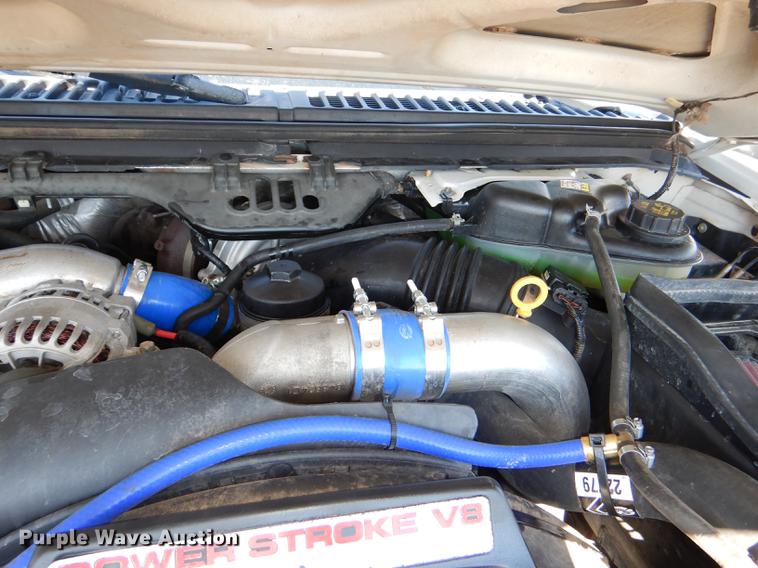 image for item DE0083 2007 Ford F350 Super Duty XL SuperCab flatbed pickup truck