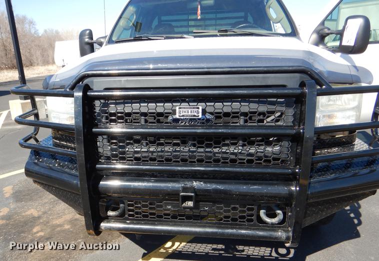 image for item DE0083 2007 Ford F350 Super Duty XL SuperCab flatbed pickup truck