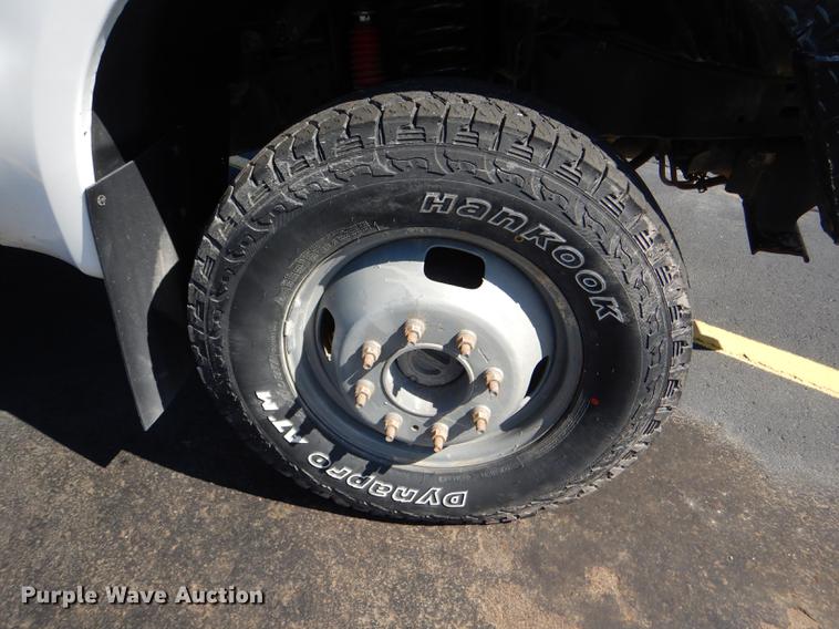 image for item DE0083 2007 Ford F350 Super Duty XL SuperCab flatbed pickup truck