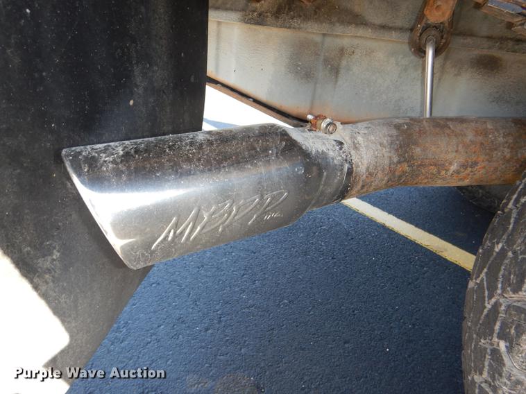 image for item DE0083 2007 Ford F350 Super Duty XL SuperCab flatbed pickup truck