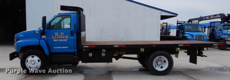 image for item DE6044 2005 GMC C7500 dump flatbed truck
