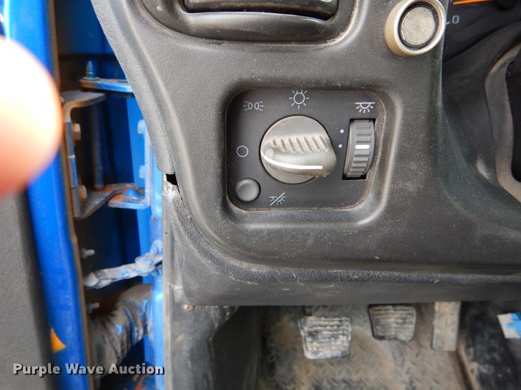 image for item DE6044 2005 GMC C7500 dump flatbed truck