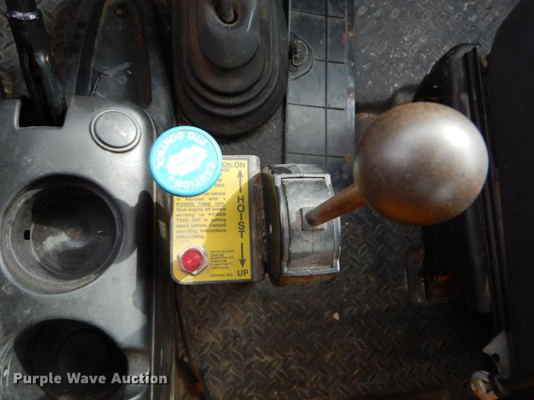 image for item DE6044 2005 GMC C7500 dump flatbed truck