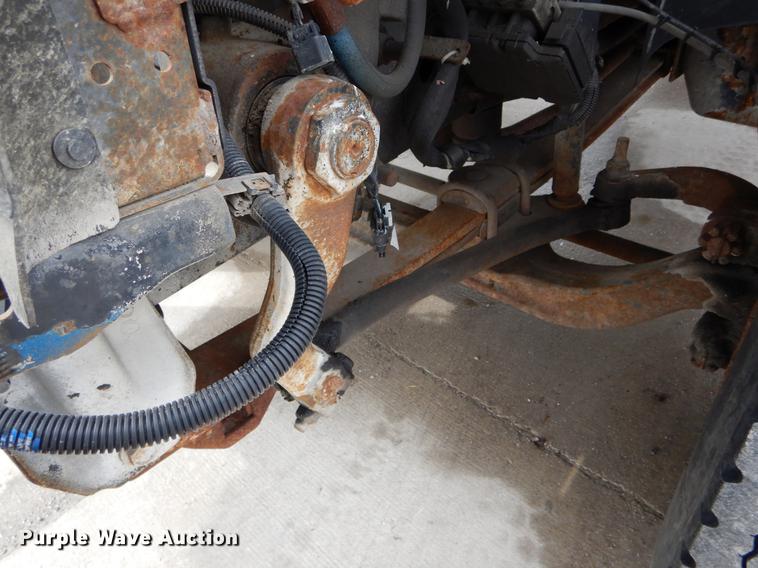 image for item DE6044 2005 GMC C7500 dump flatbed truck