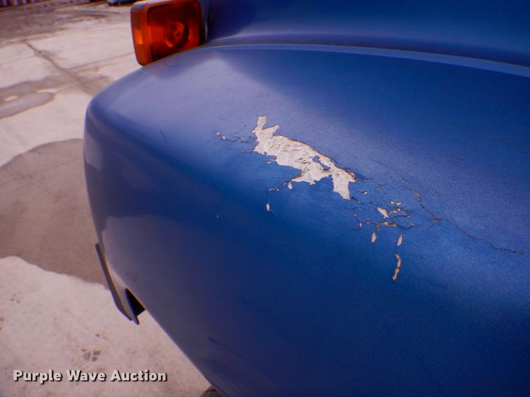 image for item DE6044 2005 GMC C7500 dump flatbed truck