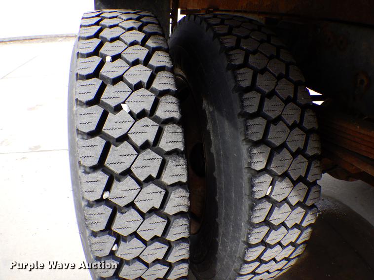 image for item DE6044 2005 GMC C7500 dump flatbed truck