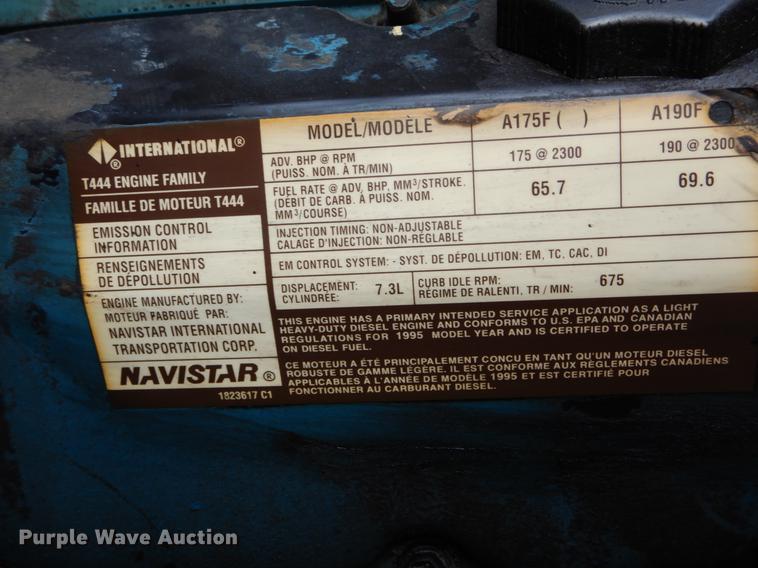 image for item DE6050 1995 International 4700 flatbed truck with crane