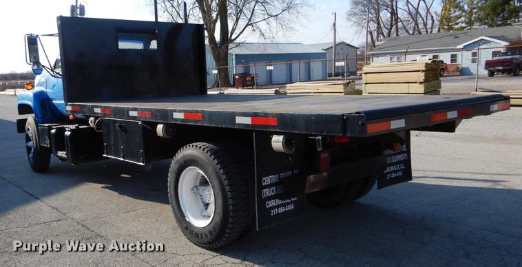 image for item DE6066 1994 GMC TopKick C5500 dump flatbed truck