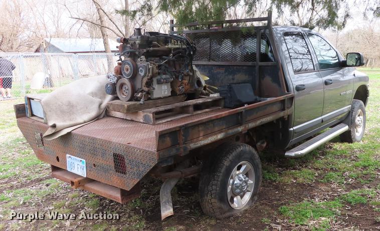 image for item DF1348 2005 Dodge Ram 2500 Quad Cab flatbed pickup truck