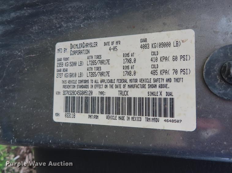 image for item DF1348 2005 Dodge Ram 2500 Quad Cab flatbed pickup truck