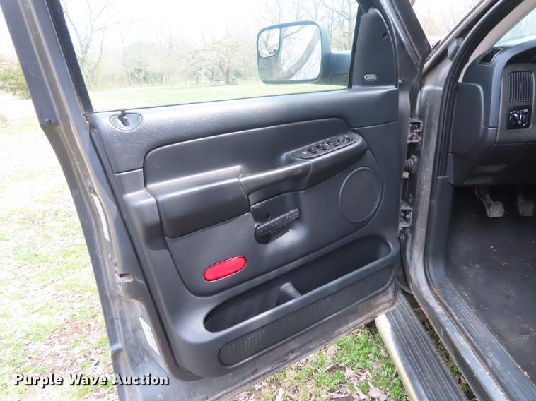 image for item DF1348 2005 Dodge Ram 2500 Quad Cab flatbed pickup truck