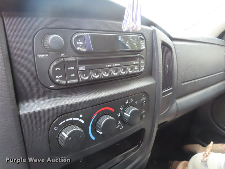 image for item DF1348 2005 Dodge Ram 2500 Quad Cab flatbed pickup truck