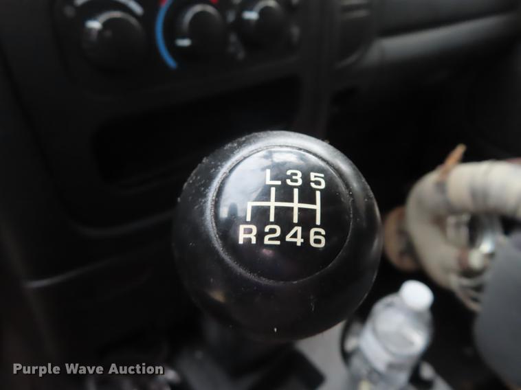 image for item DF1348 2005 Dodge Ram 2500 Quad Cab flatbed pickup truck