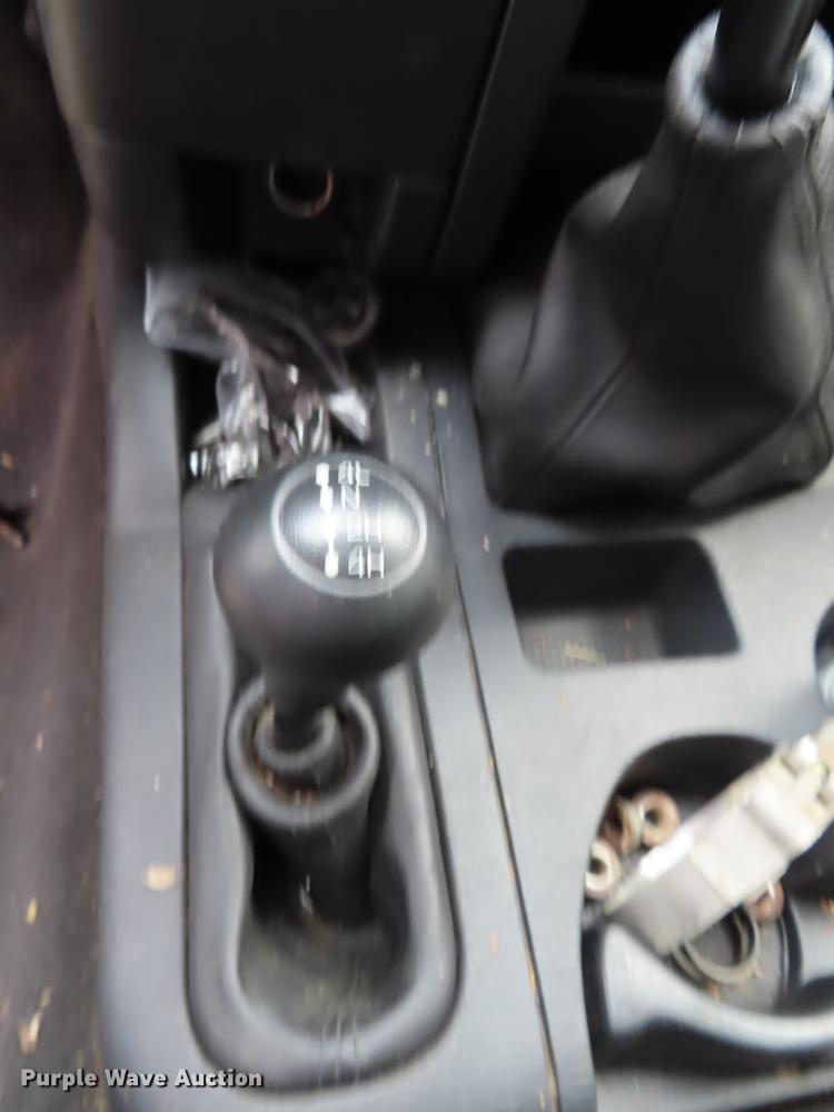 image for item DF1348 2005 Dodge Ram 2500 Quad Cab flatbed pickup truck