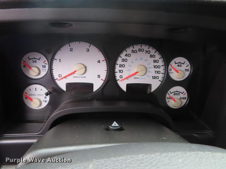 image for item DF1348 2005 Dodge Ram 2500 Quad Cab flatbed pickup truck