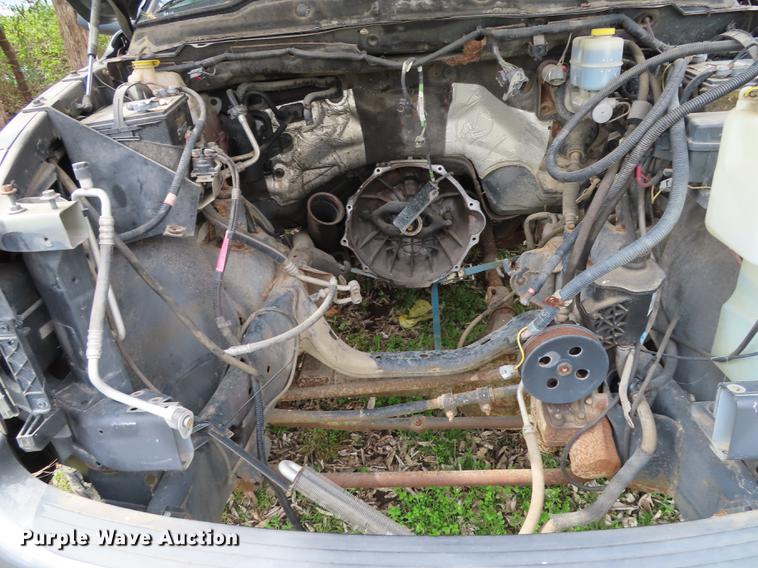 image for item DF1348 2005 Dodge Ram 2500 Quad Cab flatbed pickup truck