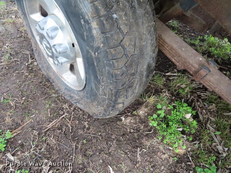 image for item DF1348 2005 Dodge Ram 2500 Quad Cab flatbed pickup truck