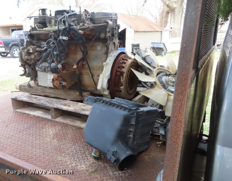 image for item DF1348 2005 Dodge Ram 2500 Quad Cab flatbed pickup truck