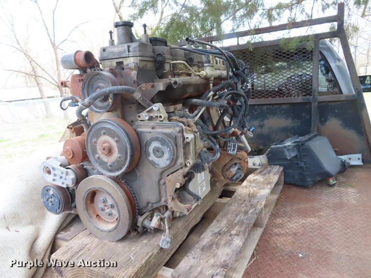 image for item DF1348 2005 Dodge Ram 2500 Quad Cab flatbed pickup truck