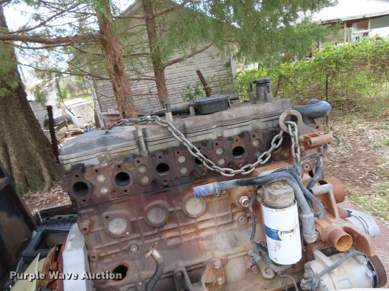 image for item DF1348 2005 Dodge Ram 2500 Quad Cab flatbed pickup truck