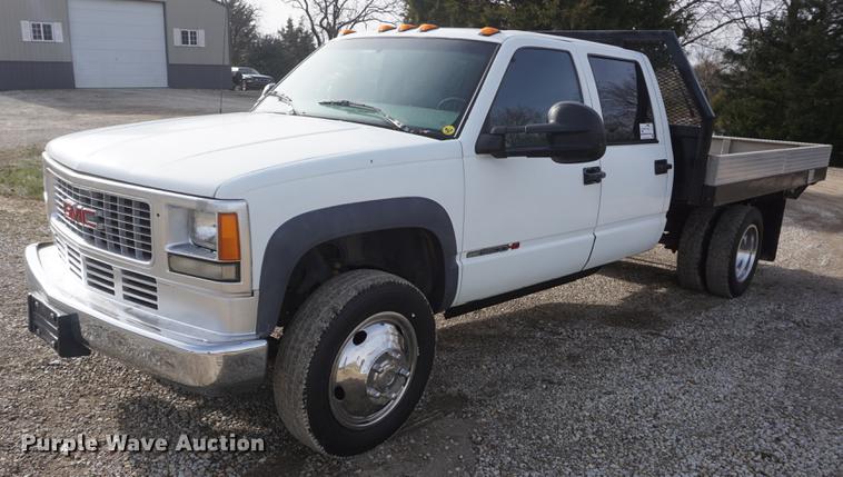 image for item DF1719 1997 GMC Sierra C3500HD Crew Cab flatbed pickup truck