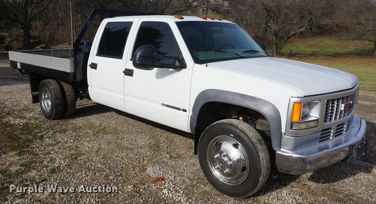 image for item DF1719 1997 GMC Sierra C3500HD Crew Cab flatbed pickup truck
