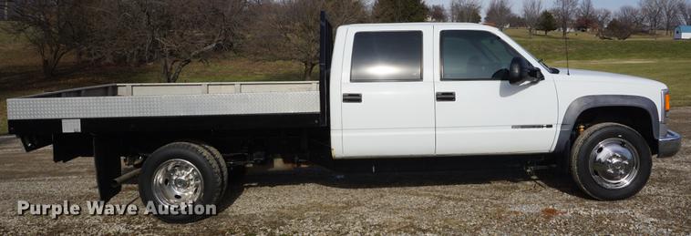 image for item DF1719 1997 GMC Sierra C3500HD Crew Cab flatbed pickup truck
