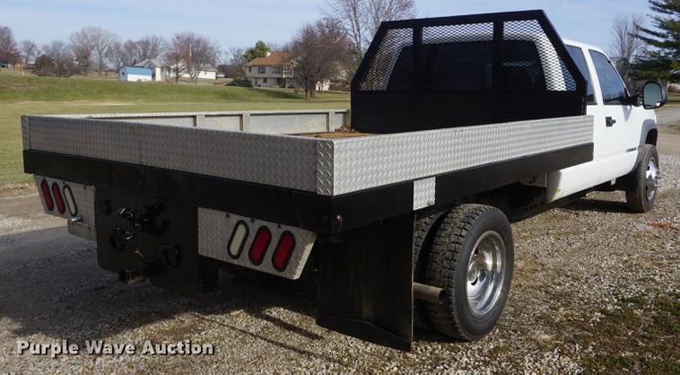 image for item DF1719 1997 GMC Sierra C3500HD Crew Cab flatbed pickup truck