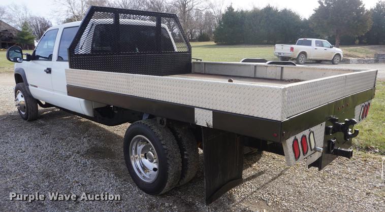 image for item DF1719 1997 GMC Sierra C3500HD Crew Cab flatbed pickup truck