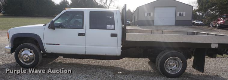 image for item DF1719 1997 GMC Sierra C3500HD Crew Cab flatbed pickup truck