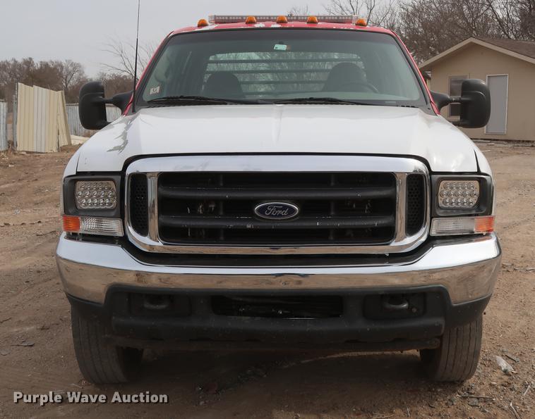 image for item DG3388 2001 Ford F550 Crew Cab rollback truck