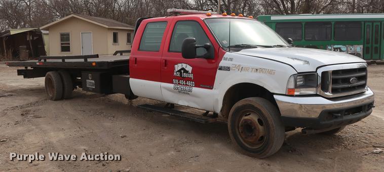 image for item DG3388 2001 Ford F550 Crew Cab rollback truck