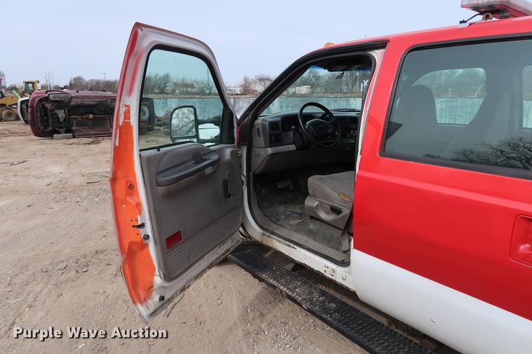 image for item DG3388 2001 Ford F550 Crew Cab rollback truck