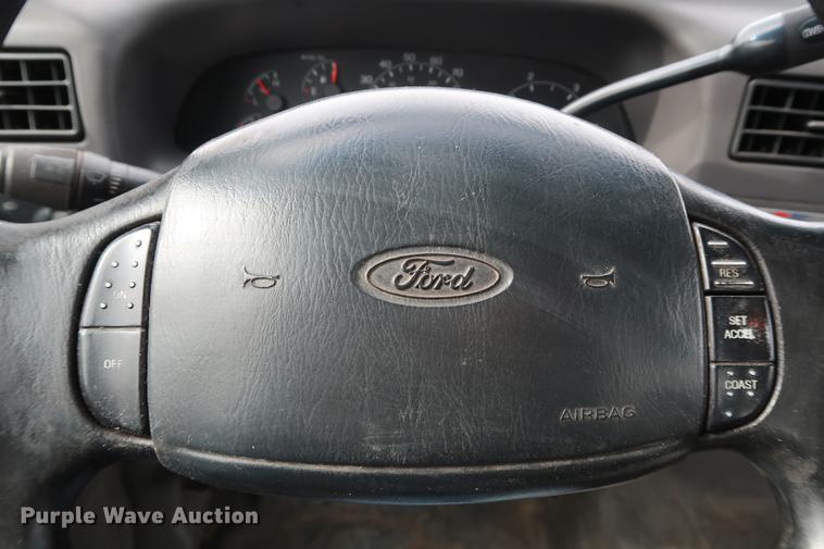 image for item DG3388 2001 Ford F550 Crew Cab rollback truck