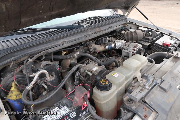 image for item DG3388 2001 Ford F550 Crew Cab rollback truck