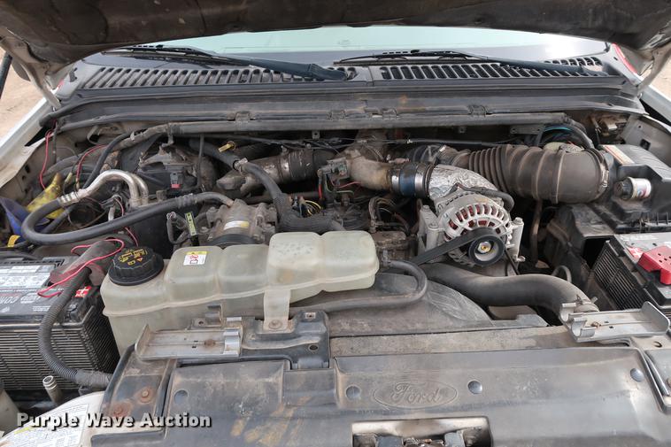 image for item DG3388 2001 Ford F550 Crew Cab rollback truck