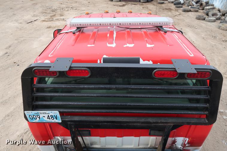 image for item DG3388 2001 Ford F550 Crew Cab rollback truck