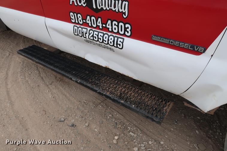 image for item DG3388 2001 Ford F550 Crew Cab rollback truck