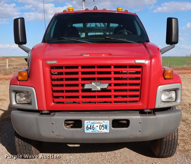 image for item DG3401 2004 Chevrolet C7500 flatbed truck with gin poles