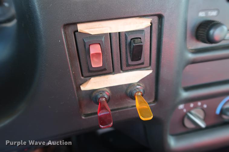 image for item DG3401 2004 Chevrolet C7500 flatbed truck with gin poles