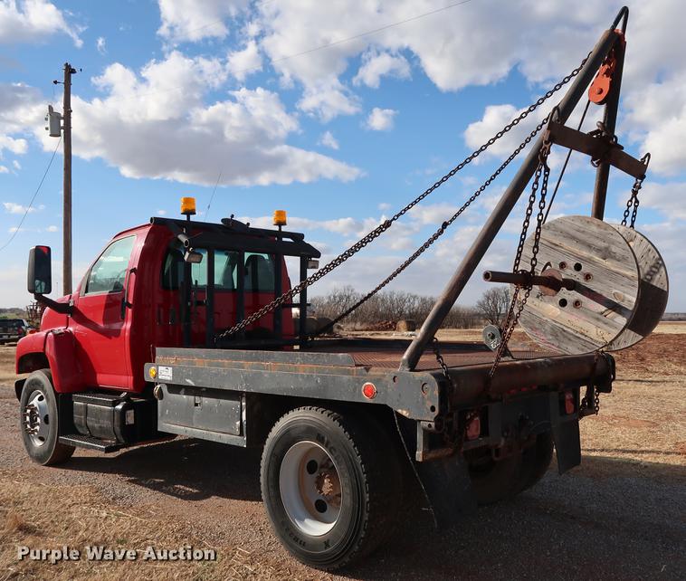 image for item DG3401 2004 Chevrolet C7500 flatbed truck with gin poles