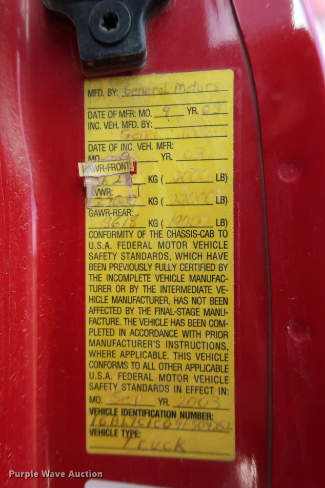 image for item DG3401 2004 Chevrolet C7500 flatbed truck with gin poles